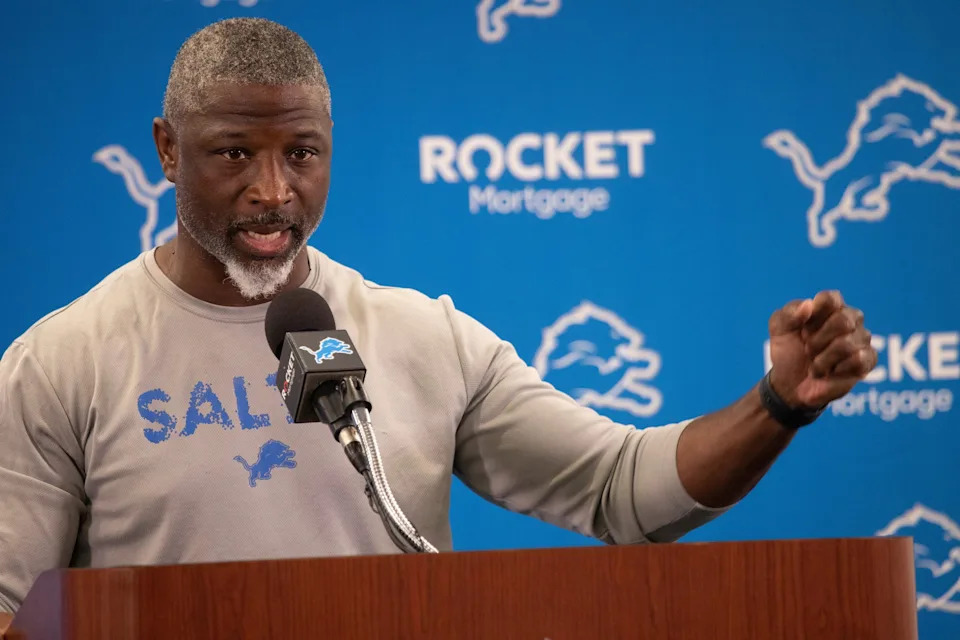 Detroit Lions defensive coordinator Aaron Glenn speaks to the media before practice begins during the Detroit Lions Organized Team Activities (OTAs) at their headquarters in Allen Park, Mich. on Thursday, May 23, 2024.