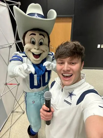 Eric Aaberg Eric Aaberg with Dallas Cowboys mascot, Rowdy