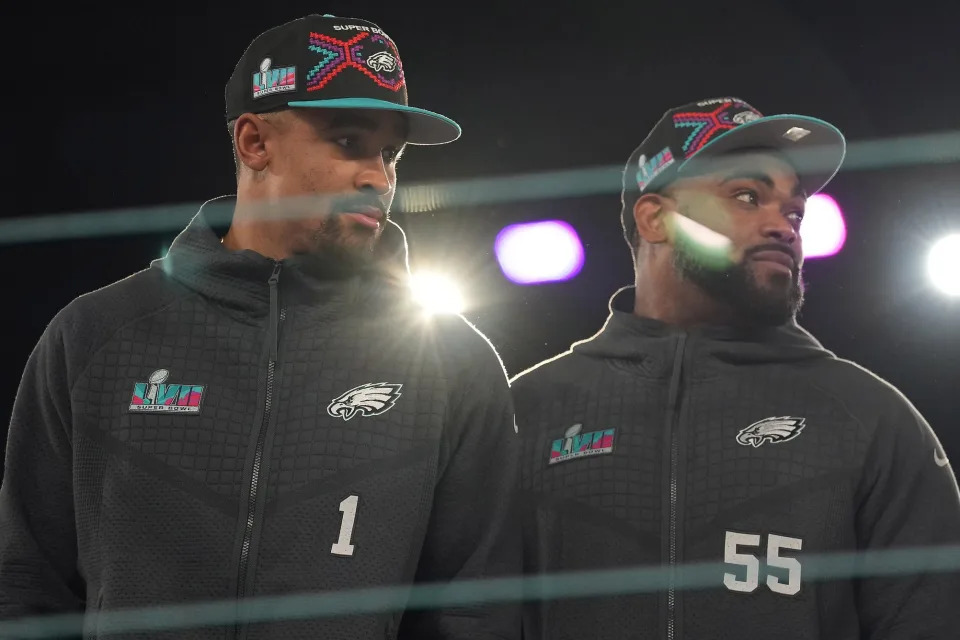 Feb 6, 2023; Phoenix, AZ, USA; Philadelphia Eagles quarterback Jalen Hurts (1) and defensive end Brandon Graham (55) during Super Bowl Opening Night at Footprint Center. Mandatory Credit: Joe Camporeale-USA TODAY Sports