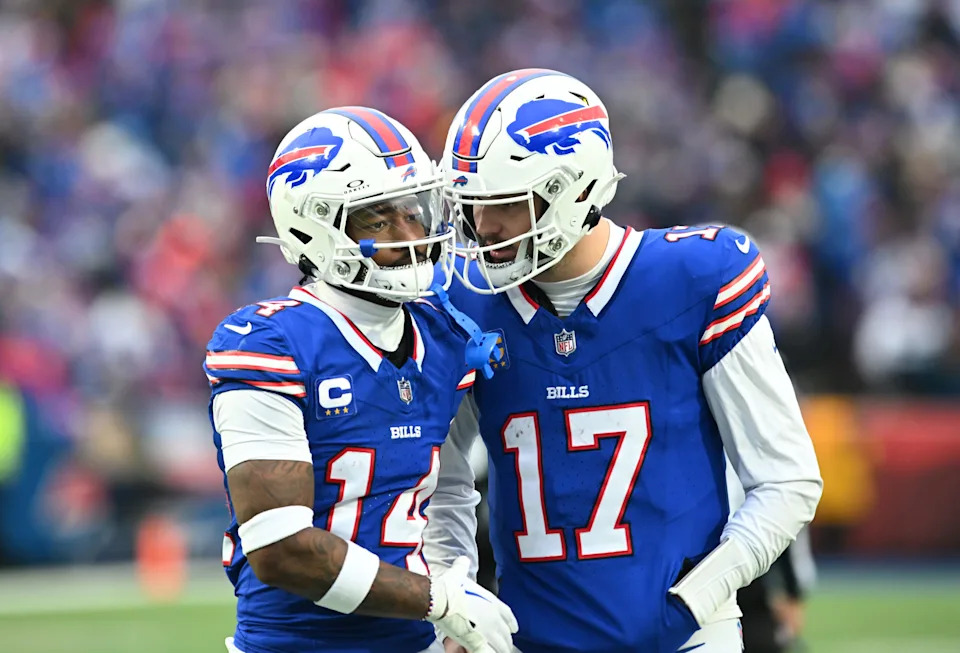 Dec 31, 2023; Orchard Park, New York, USA; Buffalo Bills quarterback Josh Allen (17) has a word with wide receiver Stefon Diggs (14) between plays in the third quarter game against the New England Patriots at Highmark Stadium. Mandatory Credit: Mark Konezny-USA TODAY Sports