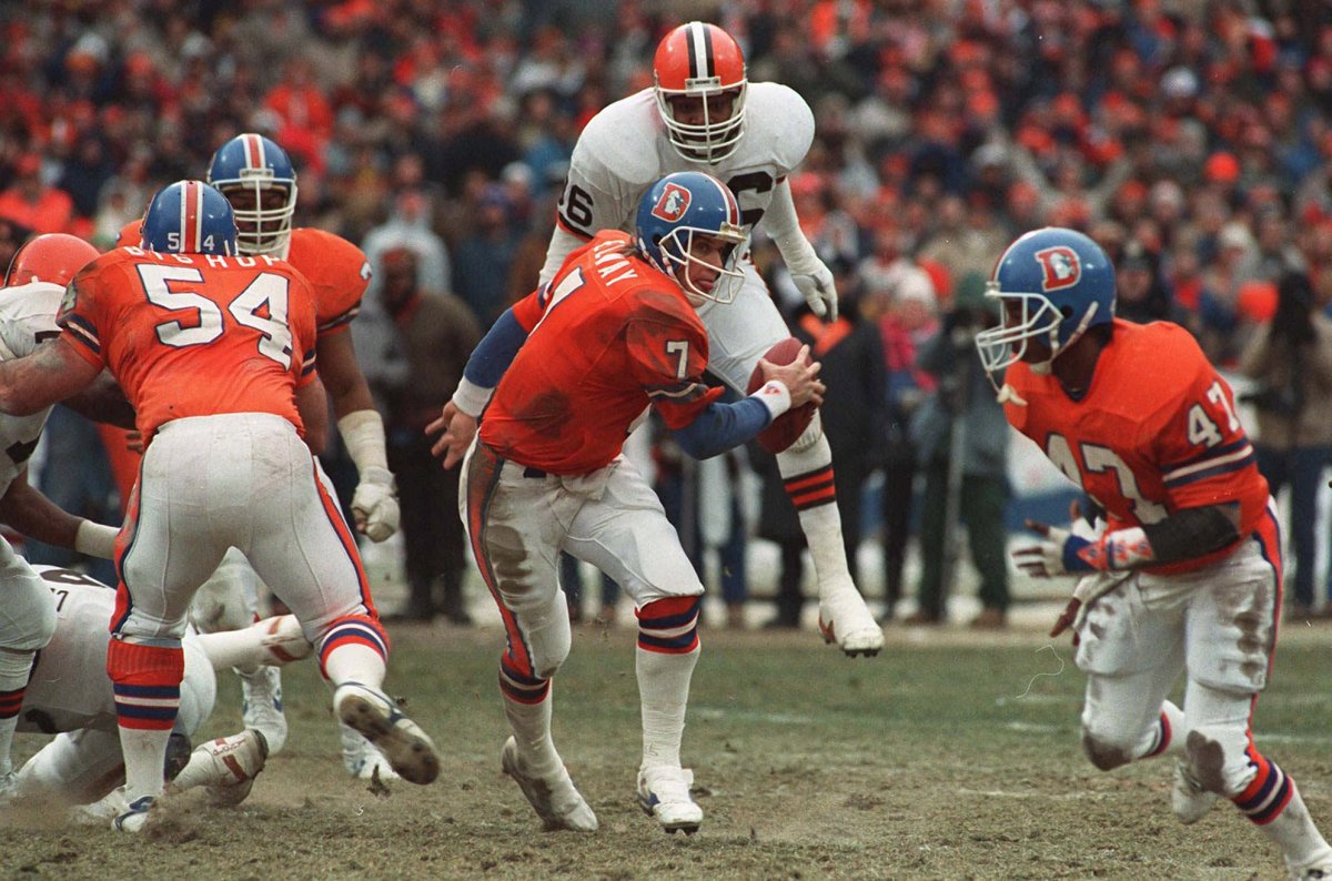John Elway leads the Denver Broncos in the 1987 AFC Chamionship game against the Cleveland Browns. John Elway leads the Denver Broncos in the 1987 AFC Chamionship game against the Cleveland Browns.