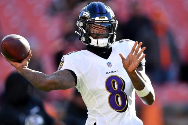 Lamar Jackson warms up before playing the Browns in 2021.