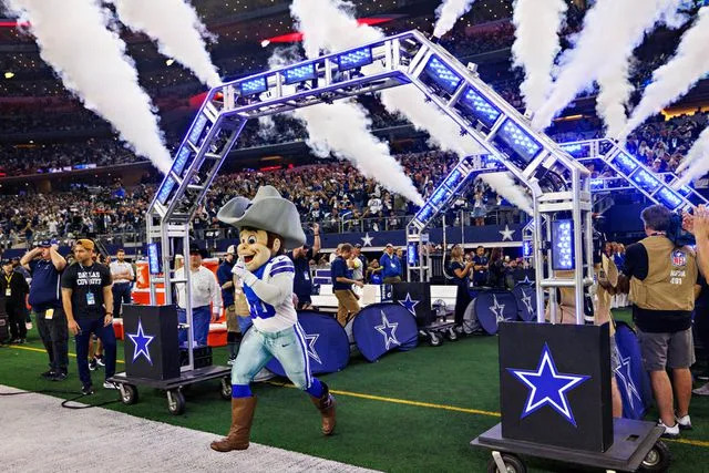 Wesley Hitt/Getty Dallas Cowboys mascot Rowdy runs out of the tunnel before a game