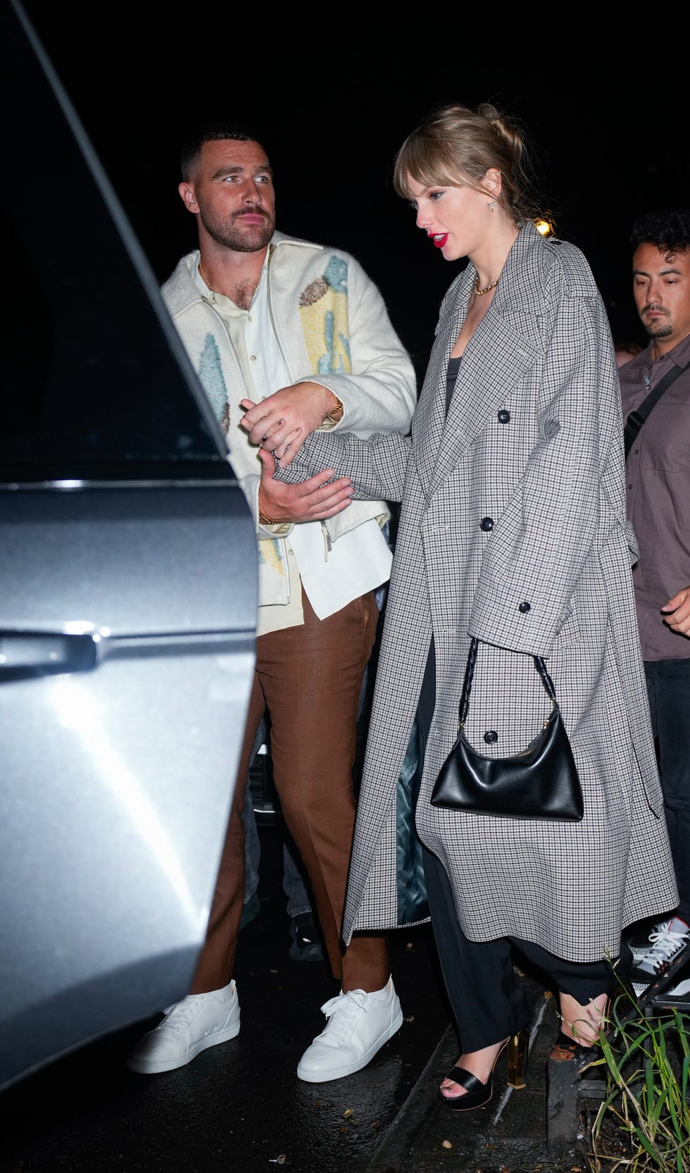 new york, new york october 15 travis kelce and taylor swift depart the snl afterparty on october 15, 2023 in new york city photo by gothamgc images