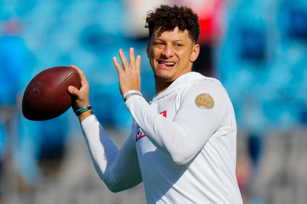 Chiefs quarterback Patrick Mahomes warms up before a game against the Panthers on Nov. 24, 2024.