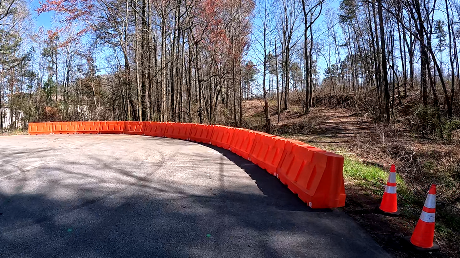 As the FOX 5 I-Team was reporting this story, the Gwinnett County Department of Transportation put up a new barricade at the dead end of West Rock Quarry Road.