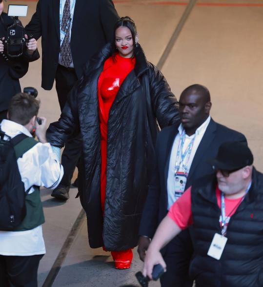 Rihanna walking in State Farm Stadium.