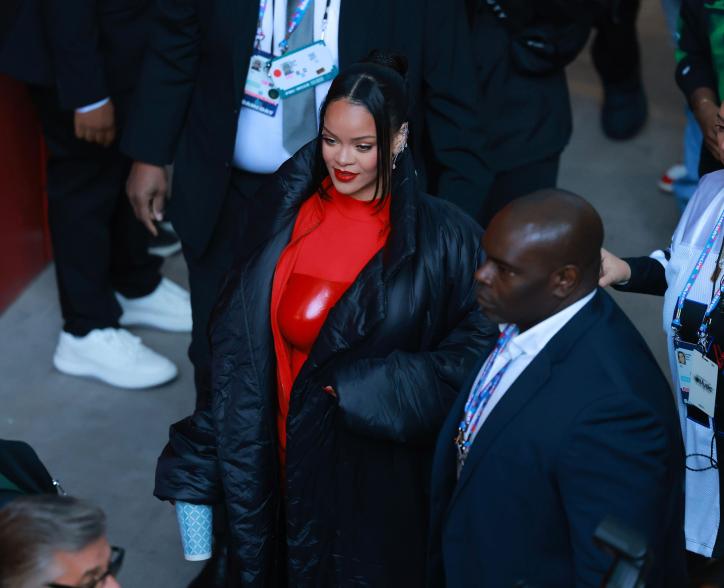 Rihanna walking in State Farm Stadium.