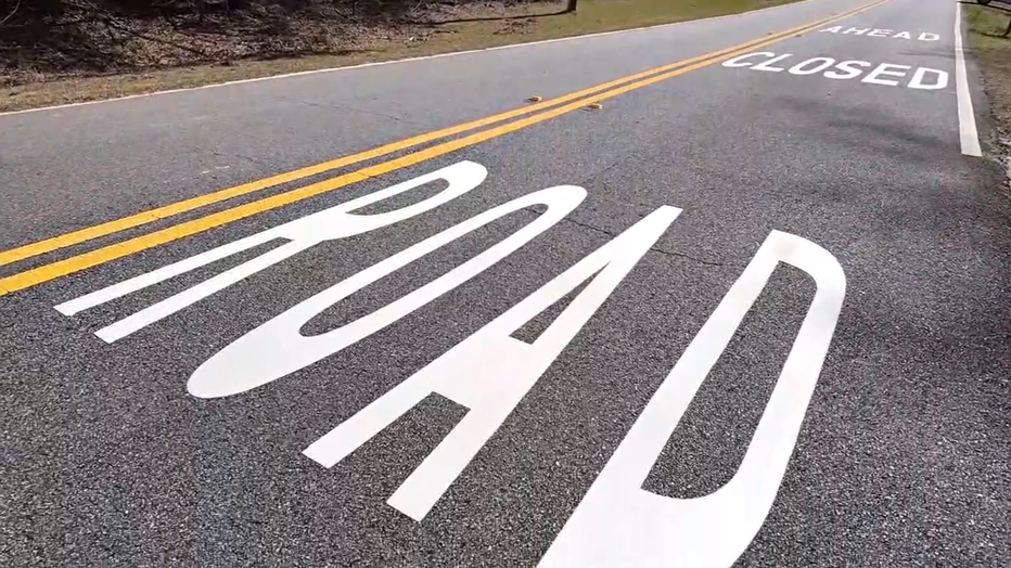 Gwinnett County DOT painted this warning on the surface of West Rock Quarry Road, just before the now barricaded dead end.