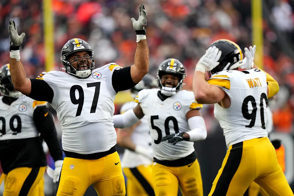 Nov 26, 2023; Cincinnati, Ohio, USA; Pittsburgh Steelers defensive tackle Cameron Heyward (97) and Pittsburgh Steelers linebacker T.J. Watt (90) celebrate a sack of Cincinnati Bengals quarterback Jake Browning (6) in the fourth quarter at Paycor Stadium. Mandatory Credit: Kareem Elgazzar-USA TODAY Sports