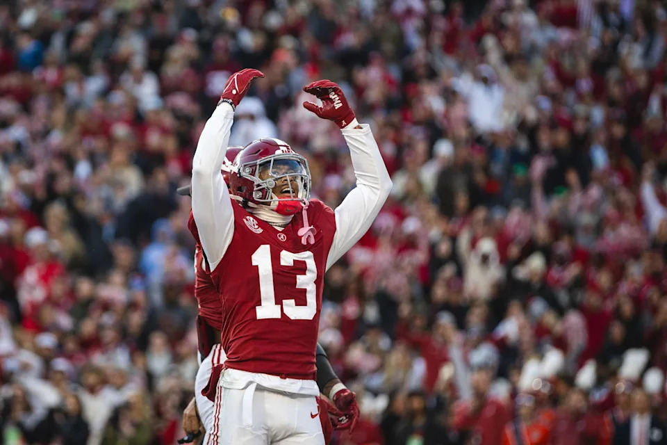 Nov 30, 2024; Tuscaloosa, Alabama, USA; Alabama Crimson Tide defensive back Malachi Moore (13) celebrates after a play against the Auburn Tigers during the second quarter at Bryant-Denny Stadium. Mandatory Credit: Will McLelland-Imagn Images