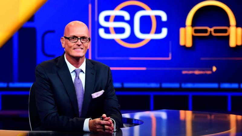 Scott Van Pelt sitting at the Sportcenter desk