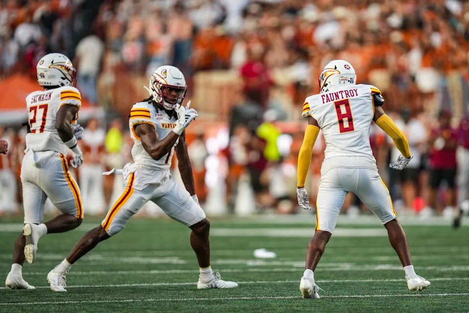 Louisiana Monroe Warhawks cornerback Car'lin Vigers (1) and Louisiana Monroe Warhawks defensive back Carl Fauntroy (8) celebrate after intercepting the ball as the Texas Longhorns take on ULM at Darrell K Royal-Texas Memorial Stadium in Austin Saturday, Sept. 21, 2024. Mikala Compton/American-Statesman
