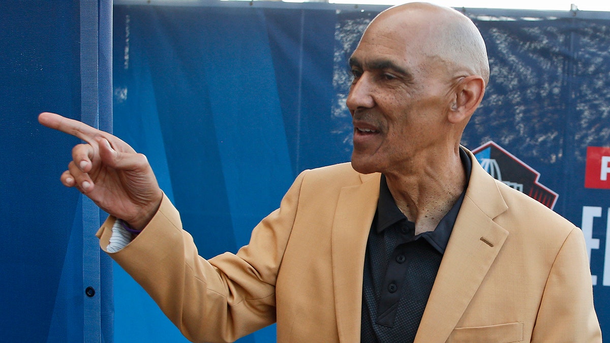 FILE - In this Aug. 3, 2019, file photo, former NFL player Tony Dungy is introduced before the induction ceremony at the Pro Football Hall of Fame in Canton, Ohio. (AP Photo/Ron Schwane, File)