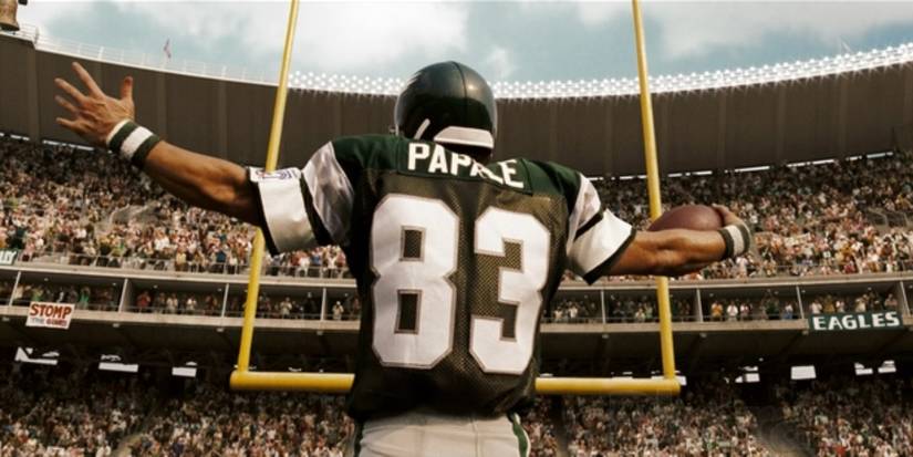 A football player named Papale cheers as he scored a touchdown