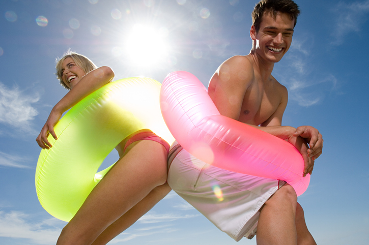 Young couple touching buttocks