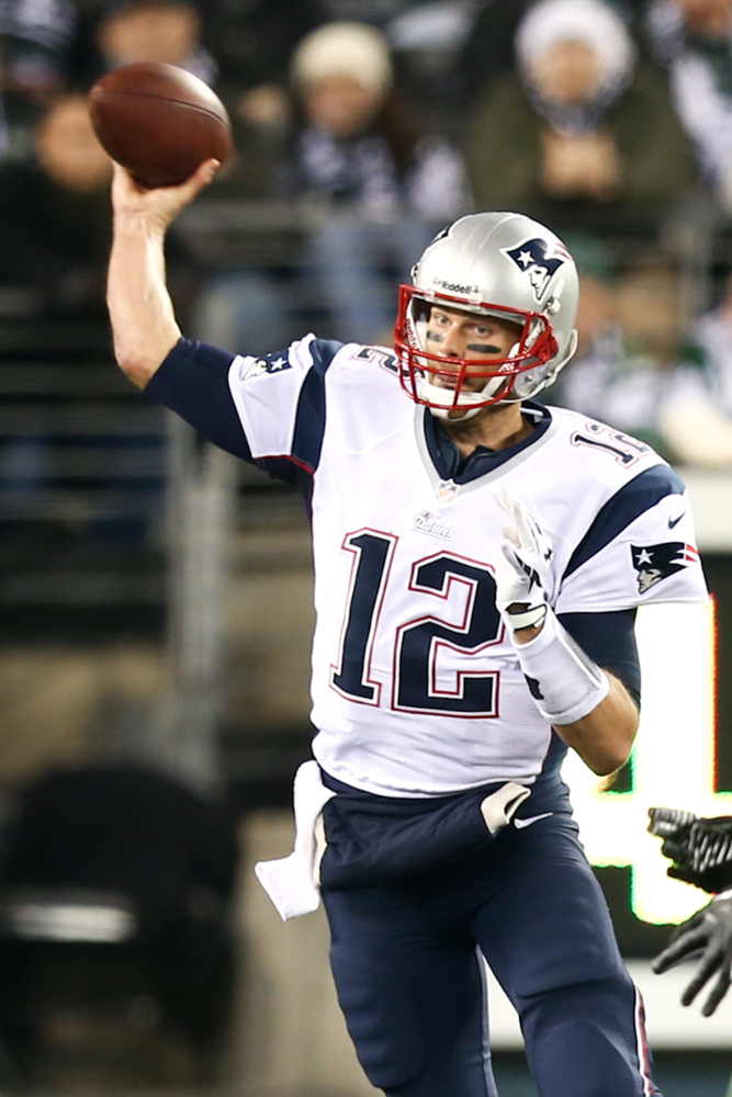 Tom Brady throwing a football