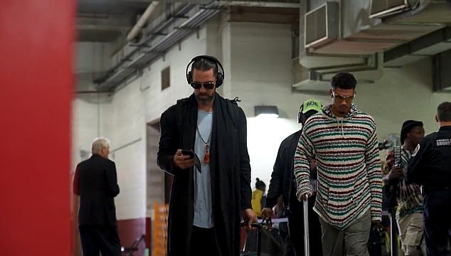 The Green Bay Packers' Aaron Rodgers wore a long coat and dark glasses in Washington
