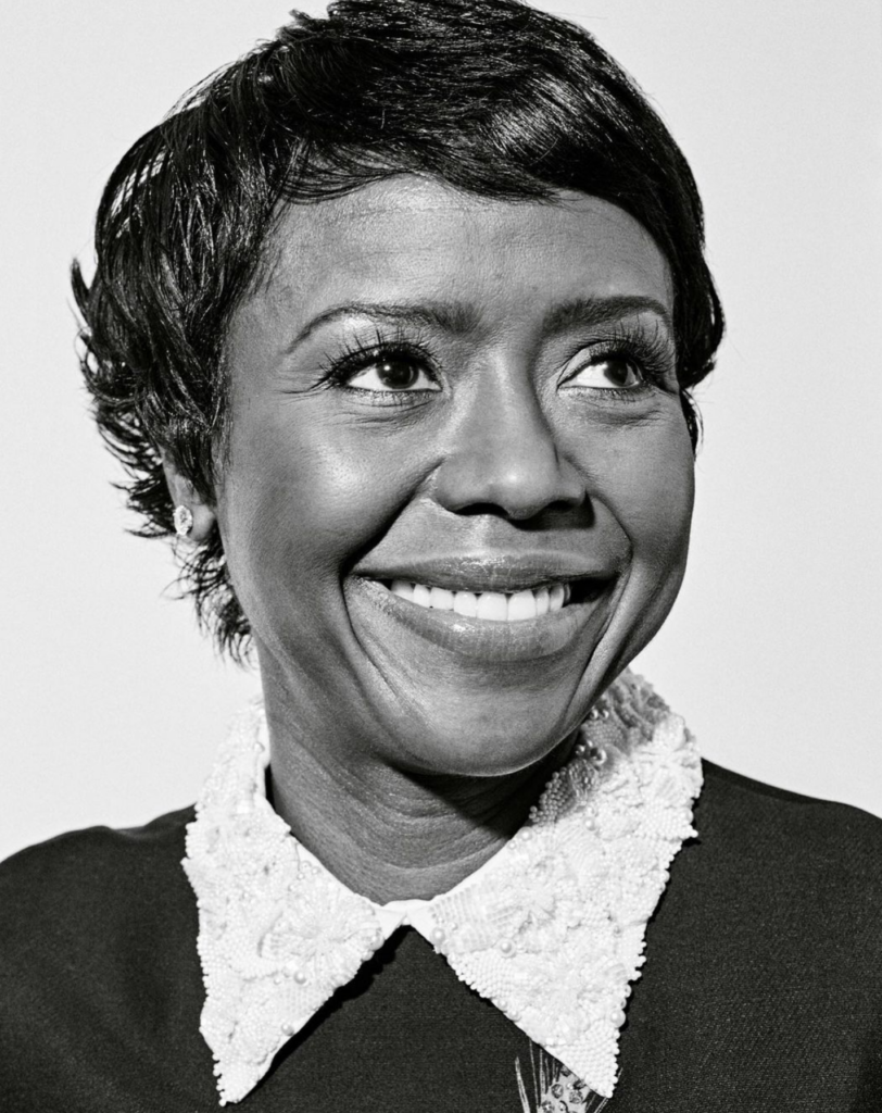 A profile picture of a woman with short hair