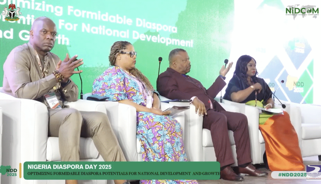Nigeria’s National Diaspora Day in Abuja, former NFL player Emil Ekiyor Sr. and Dr. Jacqueline Mohair 