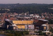 Archival full-frame photograph of Acrisure Stadium, then called Heinz Field, viewed from Mount Washington in 2014