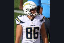 Archival 2016 photograph of NFL tight end Hunter Henry wearing a football helmet