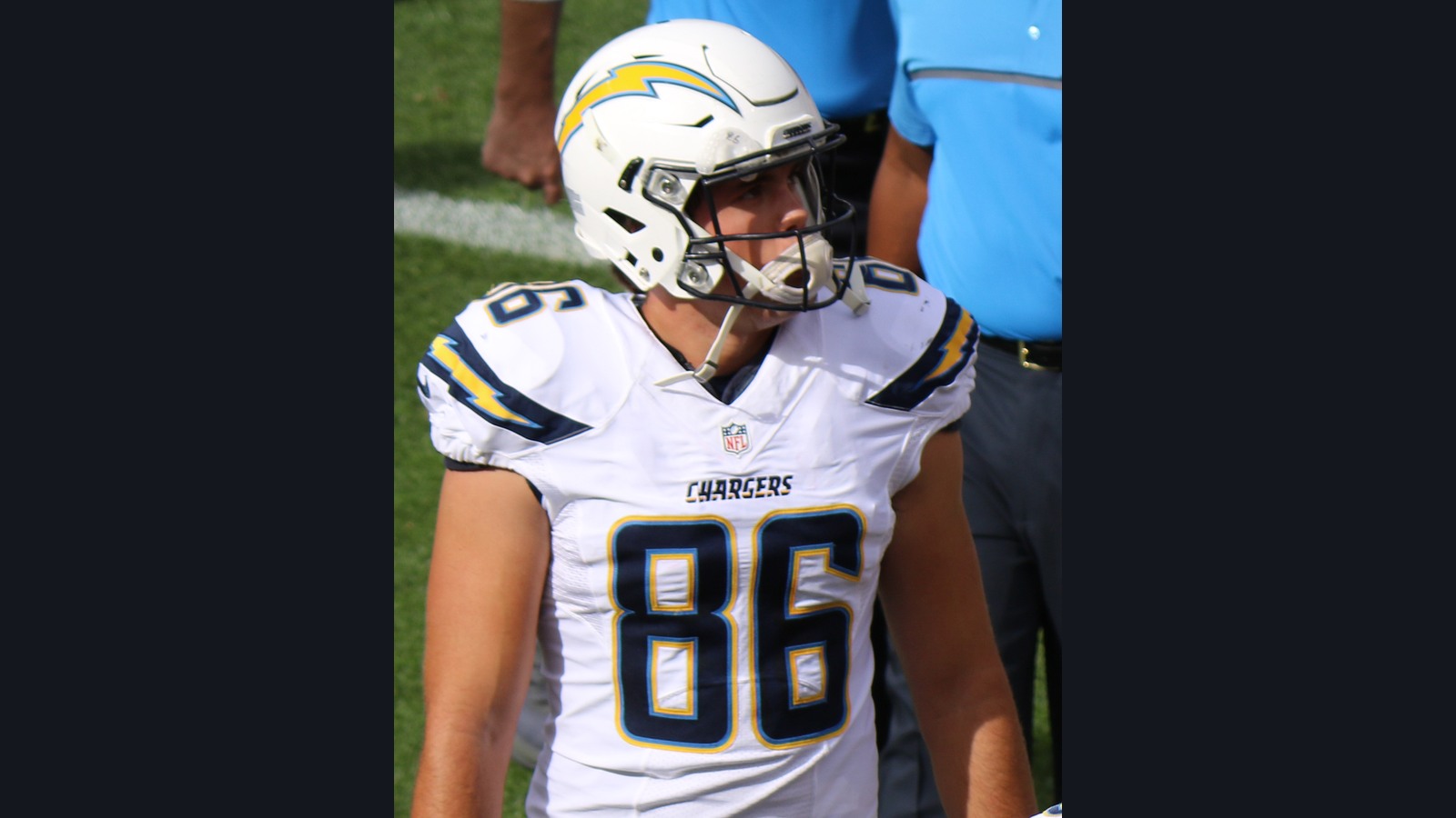 Archival 2016 photograph of NFL tight end Hunter Henry wearing a football helmet