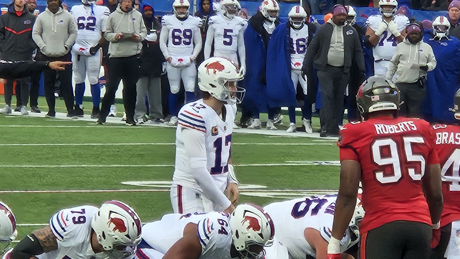 Archival photograph of Buffalo Bills quarterback Josh Allen preparing to take a snap during a 2025 game