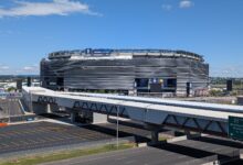 Archival full-frame exterior photograph of MetLife Stadium in East Rutherford in June 2026