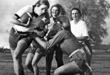 Archival full-frame 1972 photograph of a women’s recreational flag football game