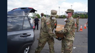 Archival photograph of Louisiana National Guard members distributing food for Second Harvest Food Bank in Metairie in April 2020